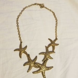 Gold starfish necklace